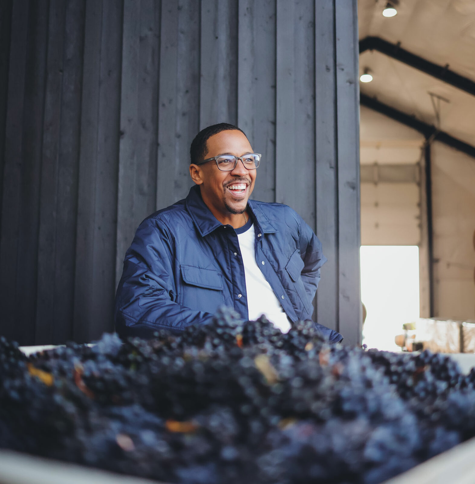 Channing Frye smiling after a fruitful harvest at Chosen Family Wines